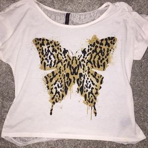 black, white, and gold butterfly shirt